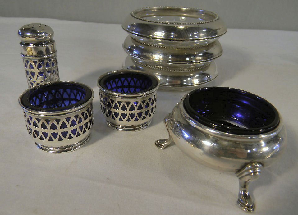 Lot of sterling silver including two Gorham sterling sa: Lot of sterling silver including two Gorham sterling salts with cobalt liners, sterling shaker with cobalt glass insert, sterling footed salt with liner, three sterling rimmed coasters