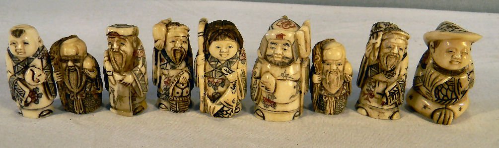 Lot of nine carved Japanese netsuke, each signed: Lot of nine carved Japanese netsuke, each signed