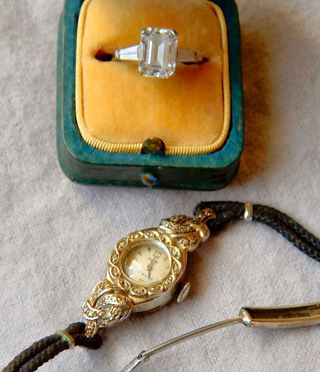 14K white gold cased 19 jewel ladies Elgin watch: 14K white gold cased 19 jewel ladies Elgin watch in running order together with 14K white gold ring set with unidentified stones (not diamonds), size 5.75, 3.5 grams with stones.