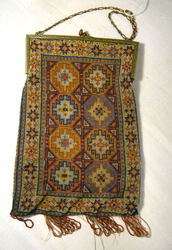 Antique beaded purse, 11" X 7.5",: Antique beaded purse, 11" X 7.5", base metal frame, most of fringe missing from bottom