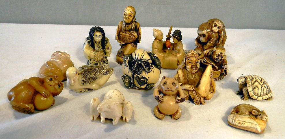 Lot of fourteen cast resin netsuke: Lot of fourteen cast resin netsuke, human and animal forms