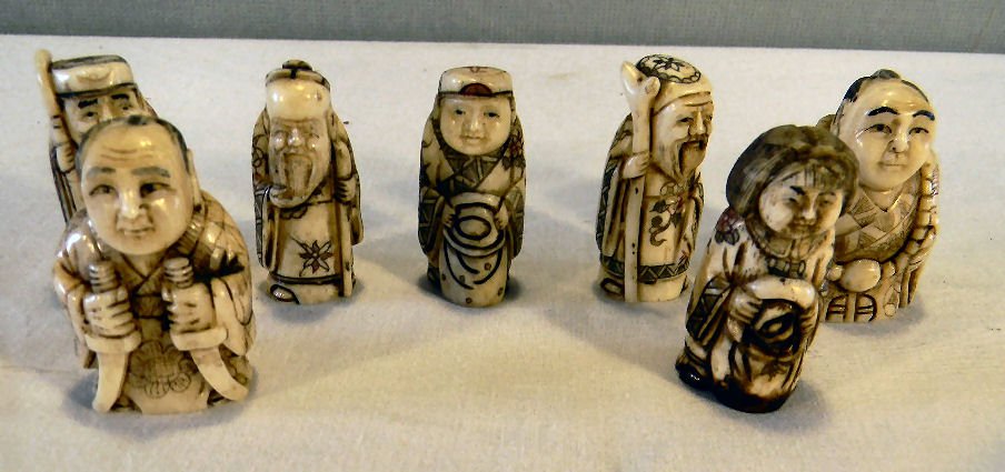 Lot of seven carved bone netsuke, all signed: Lot of seven carved bone netsuke, all signed