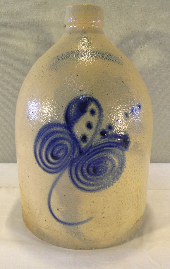 Two gallon stoneware jug "L. Pewtress & Co. New Haven, : Two gallon stoneware jug "L. Pewtress & Co. New Haven, Conn", no chips or cracks, fissure lines on bottom, 14" high