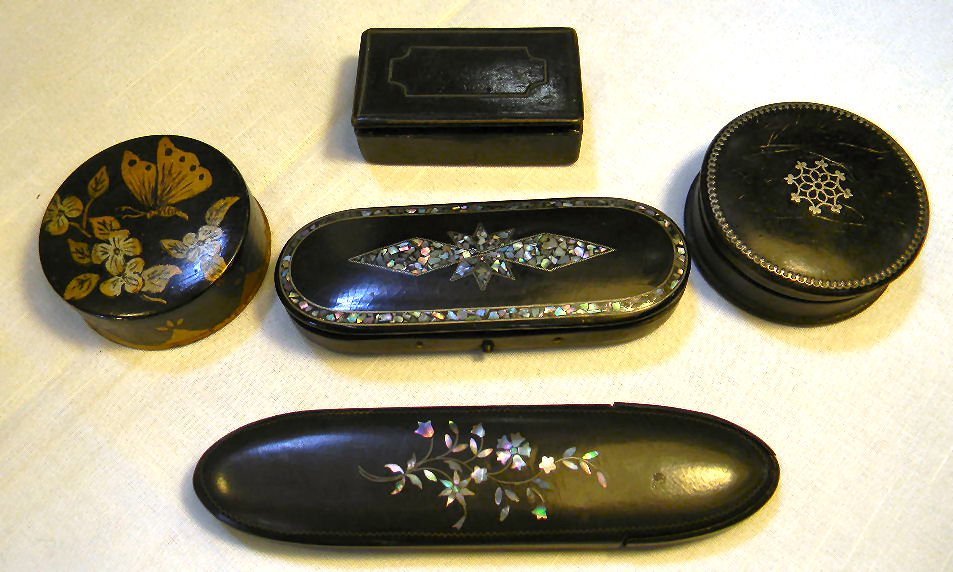 Lot including lacquered2 papier mache eyeglass cases i: Lot including lacquered2 papier mache eyeglass cases in very good condition, round papier mache box, round painted tin box signed C. Haines, and rectangular box with damaged edge on lid and front