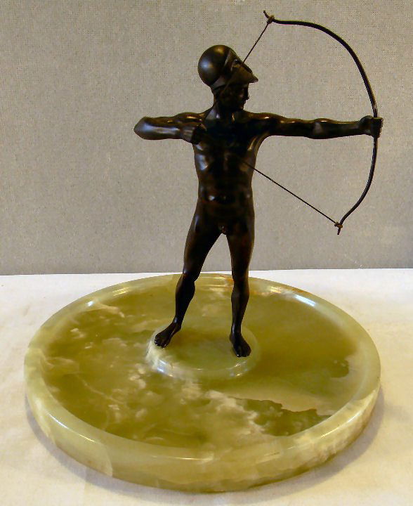 Nude bronze archer figure mounted on green onyx desk tr: Nude bronze archer figure mounted on green onyx desk tray, 11" diameter tray, bronze is 9" high, bronze unsigned, excellent patina. Left foot is bolted, right foot is loose and can turn on base, scrat