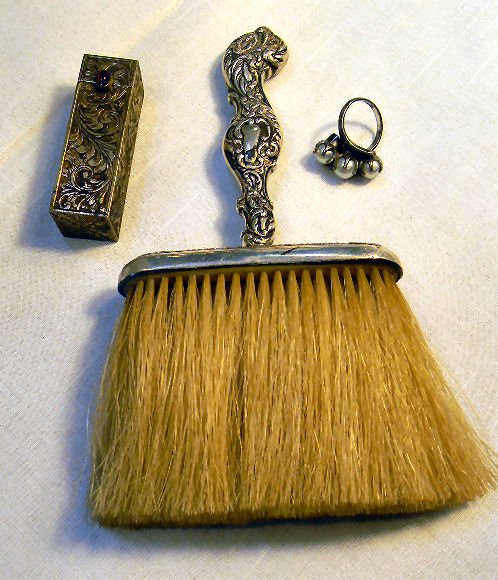 Lot including sterling handled brush, sterling ring wit: Lot including sterling handled brush, sterling ring with three pearls size 7, and .800 silver lipstick case, 3.47 troy oz total weight