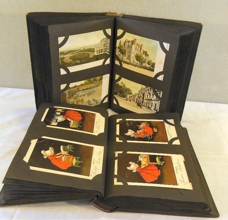 Two late 19th early 20th century post card albums - hol: Two late 19th early 20th century post card albums - holidays, Sunbonnet Babies, set of bears days of week, towns, real photo, hotels, New York City, few European, approx.. 380 cards.