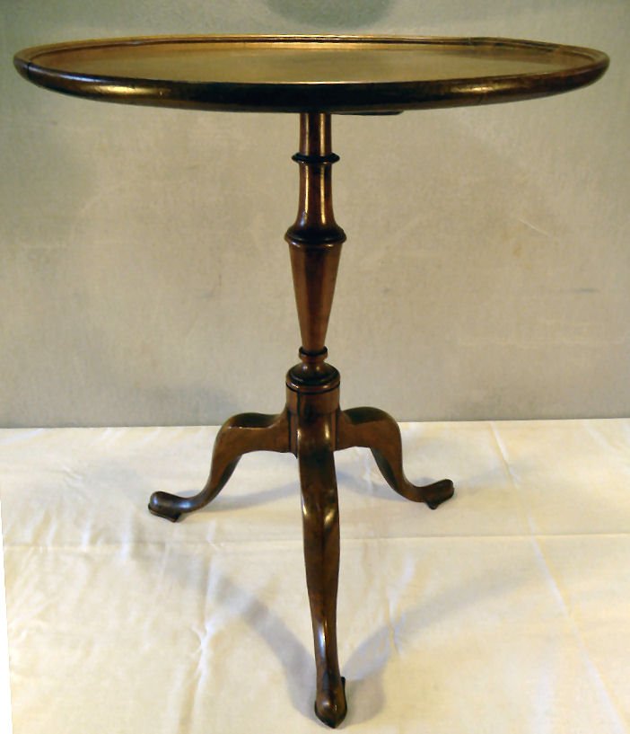 Period mahogany candle stand 25.5" high, 2.5" diameter,: Period mahogany candle stand 25.5" high, 2.5" diameter, repairs to feet, one foot broken and reattached, old repair to top