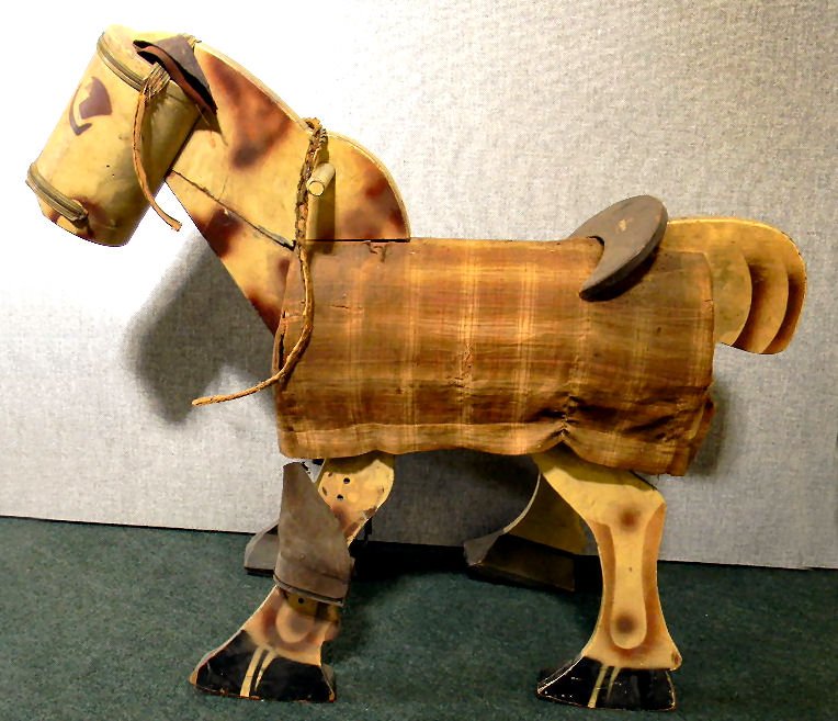 Peppy hobby horse, rocker, very good condition, 33" hig: Peppy hobby horse, rocker, very good condition, 33" high, 39" long, adjustable stirrups, rein broken, leather ears, paint very good, cloth cover worn