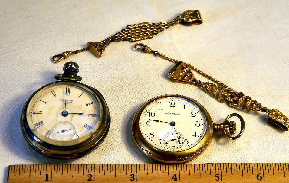 Two pocket watches and two gold filled watch chains, Am: Two pocket watches and two gold filled watch chains, American Waltham watch with coin silver case, not running; 17 jewel Waltham with gold filled case, not running,
