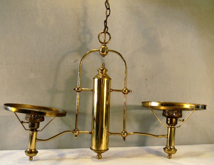 Antique brass double hanging light fixture, no breaks o: Antique brass double hanging light fixture, no breaks or dents on font, electrified, 10.25 fitter for shades, 33" long, 22" high not including chain
