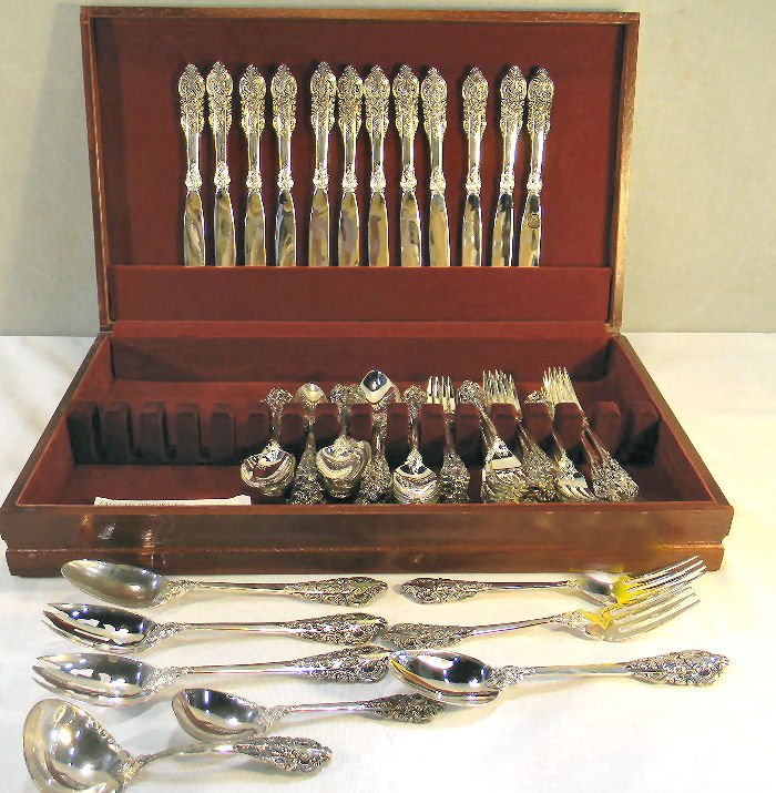 Silverplate flatware set Baroque pattern by Godinger, 9: Silverplate flatware set Baroque pattern by Godinger, 92 pieces, excellent condition with little use, 12 - 9" knives, soup spoons and 7.5" forks, 24 - salad forks and teaspoons, two serving forks, two