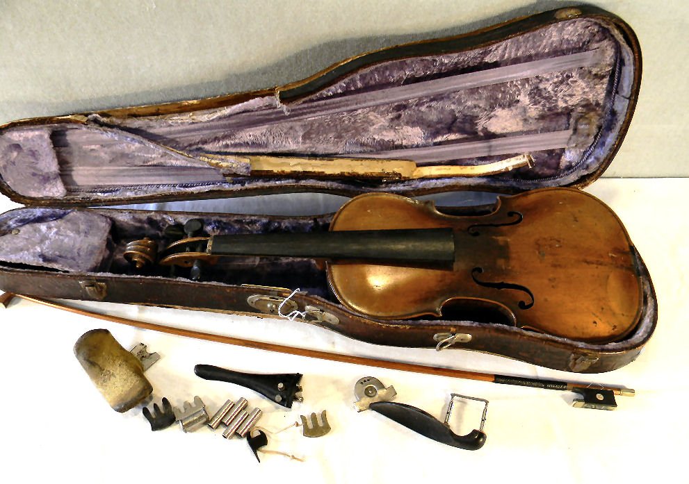 Estate violin labeled "Jacobus Stainer: Estate violin labeled "Jacobus Stainer in Absam prope Oempontum 1716" also branded "Stainer" on back, 23.25" long. The violin is being sold "as is". Bow has no maker mark. Case is rough.