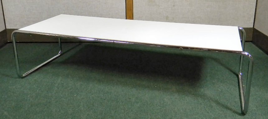 Chrome & white laminate modern coffee table, excellent: Chrome & white laminate modern coffee table, excellent condition, minor scuffs, 53" X 19"