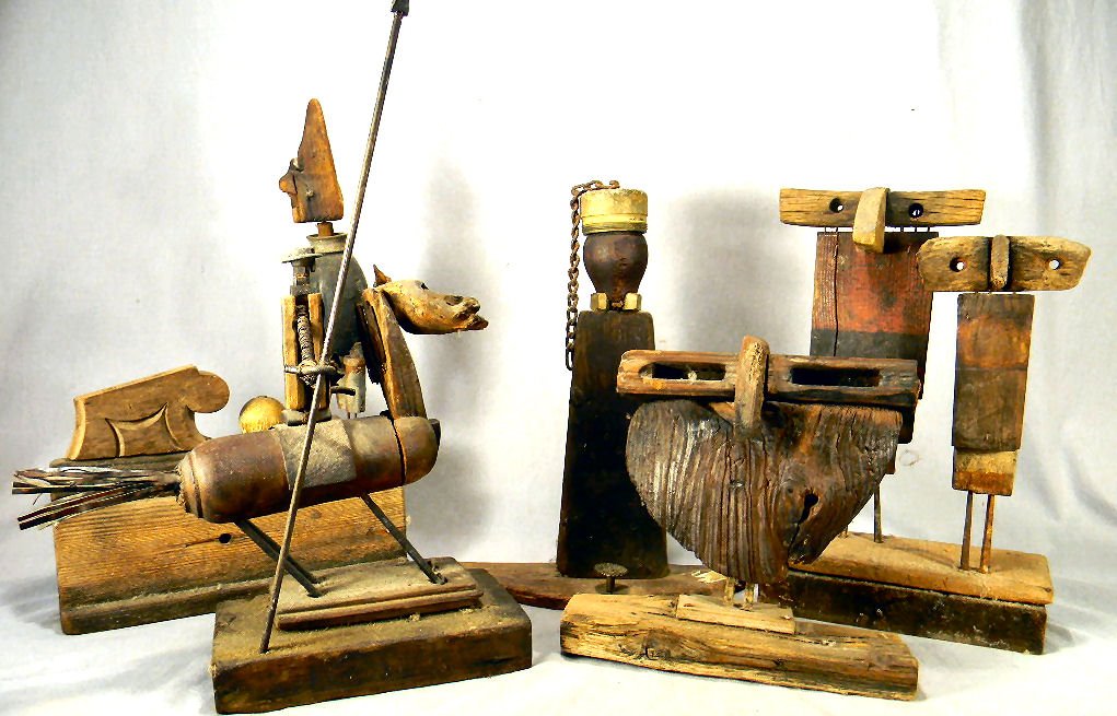 Lot of five rustic wood sculptures by mid 20th century: Lot of five rustic wood sculptures by mid 20th century Cape Cod artist Hans Herbatschek-Hansen, all except double figure is signed, one ear missing off horse, nose and chin on clown figure missing