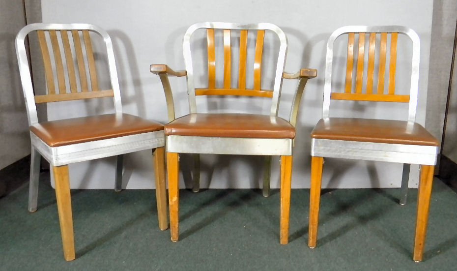 Three Shaw Walker aluminum and wood chairs, two sides: Three Shaw Walker aluminum and wood chairs, two sides on one arm chair, 31.5" high