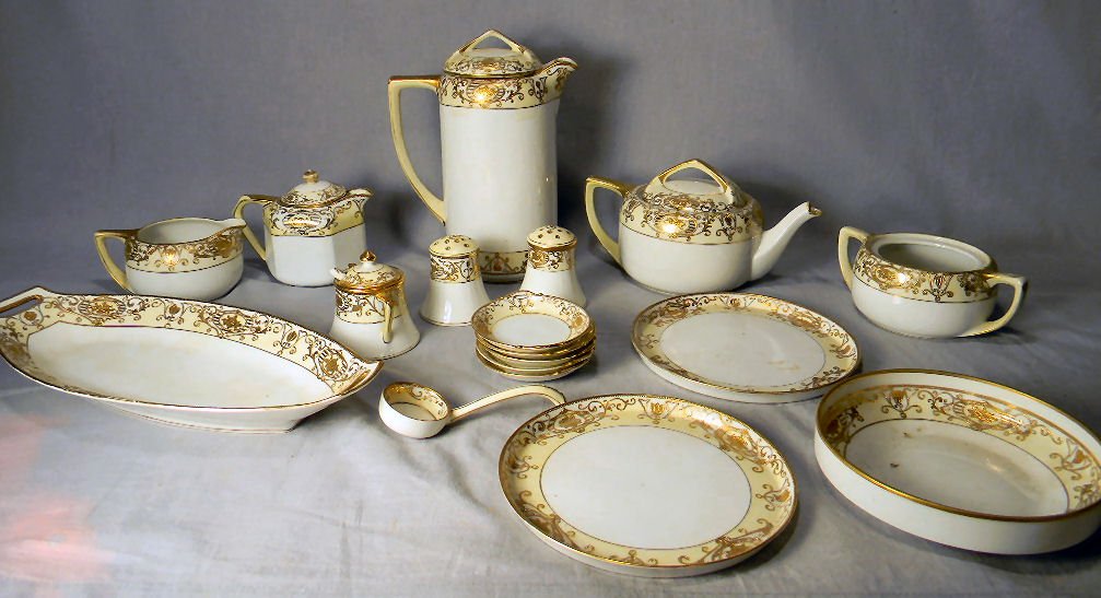 Lot of Noritake and Nippon pattern 16034, all with no: Lot of Noritake and Nippon pattern 16034, all with no chips or cracks, gold wear with handles, included are, 12" celery tray, two 7" round trays, 6" round bowl, sauce ladle, tea pot, chocolate pot, su