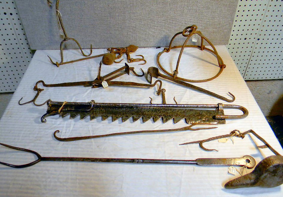 Lot of primitive iron hearth items, two forks, jack,: Lot of primitive iron hearth items, two forks, jack, pot hanger, scales, betty lamp, etc.
