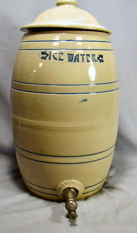 Four gallon stoneware ice water crock with spout, lid: Four gallon stoneware ice water crock with spout, lid no original, 18" to top of lid, chips on lid and edge of crock, surface line on side shown in photo