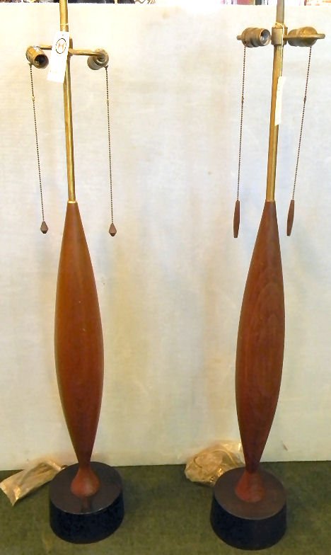 Pair of tall Heifetz lamp bases with tags, 50" high to: Pair of tall Heifetz lamp bases with tags, 50" high to top of sockets