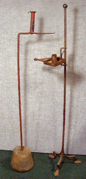 Two wrought iron primitive candle stands: Two wrought iron primitive candle stands, 42" & 44" high, one with folding arm and adjustable height, not period