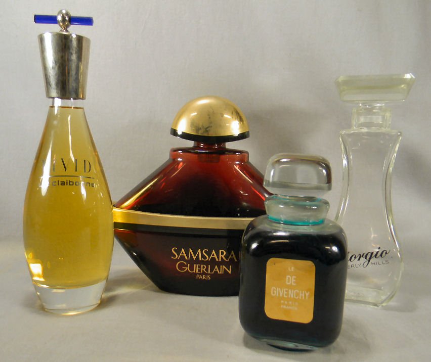 Four factice perfume bottles, Samsara Guerlain: Four factice perfume bottles, Samsara Guerlain, Giorgio, De Givenchy and Liz Claiborne Vivid, no chips or cracks