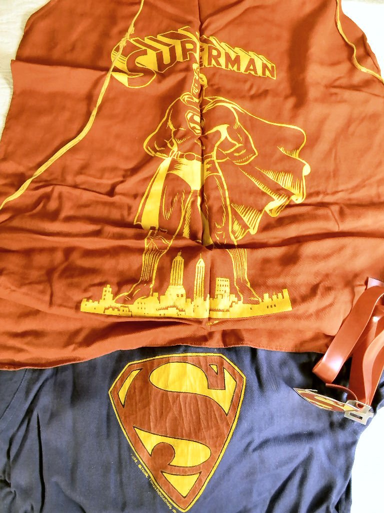 Vintage child's Superman costume circa 1950's,: Vintage child's Superman costume circa 1950's, marked "Copr. National Comics Publications, Inc." Belt and buckle, cape (tear at string shown in photo), jersey and pants (hole in knee). Very good color