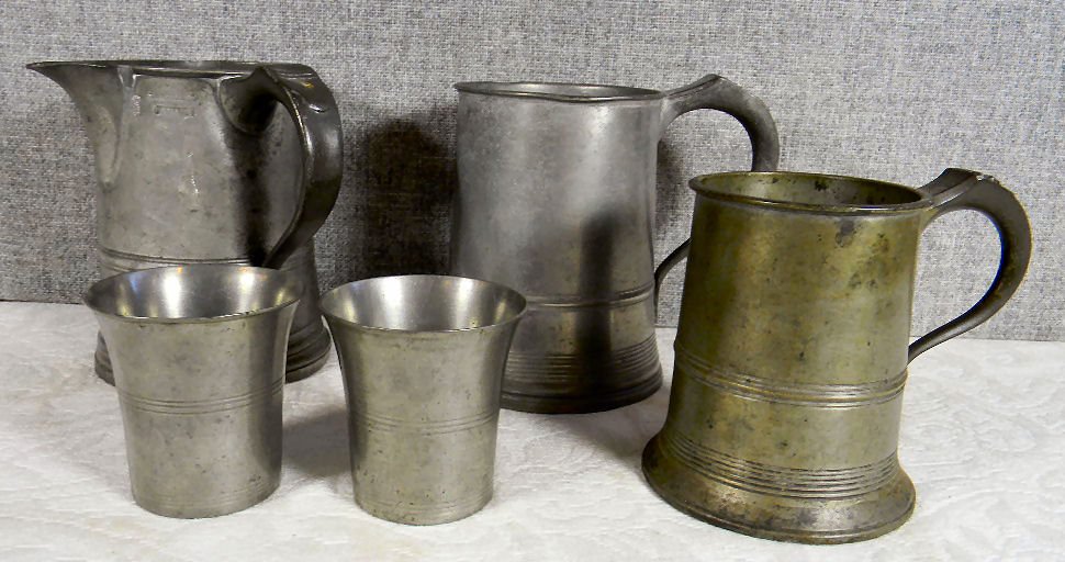 Lot 19th century pewter including 2 one quart measures: Lot 19th century pewter including 2 one quart measures marked James Yates and second marked Yates Birch, marked glass bottom tankard and two tumblers