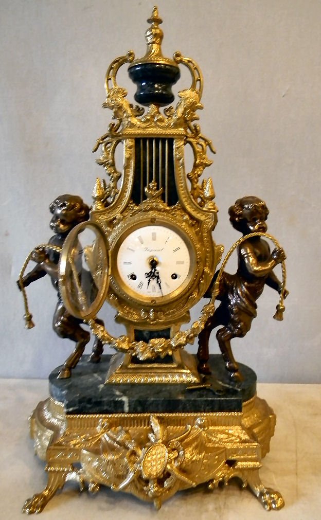 Contemporary brass mantle clock, made in Italy: Contemporary brass mantle clock, made in Italy, German clock movement, not running, 24.5" high, 14" wide