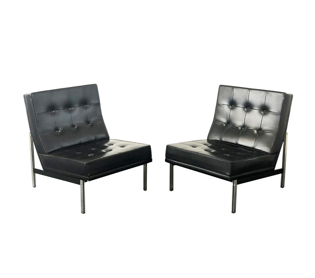 Lounge Chairs by Florence Knoll for Knoll inc, 1960s,: Armchairs with aluminium frame and black leather upholstery. Dim:H 60 cm Width 76 cm, Depth 76 cm