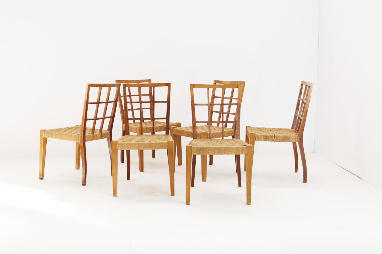 Set of six Chair by Paolo Buffa 1950: These 50s dining chairs, designed by Paolo Buffa, are made of wicker. in Rattan, Wood. Width 45 cm Depth 46 cm Height 80 cm