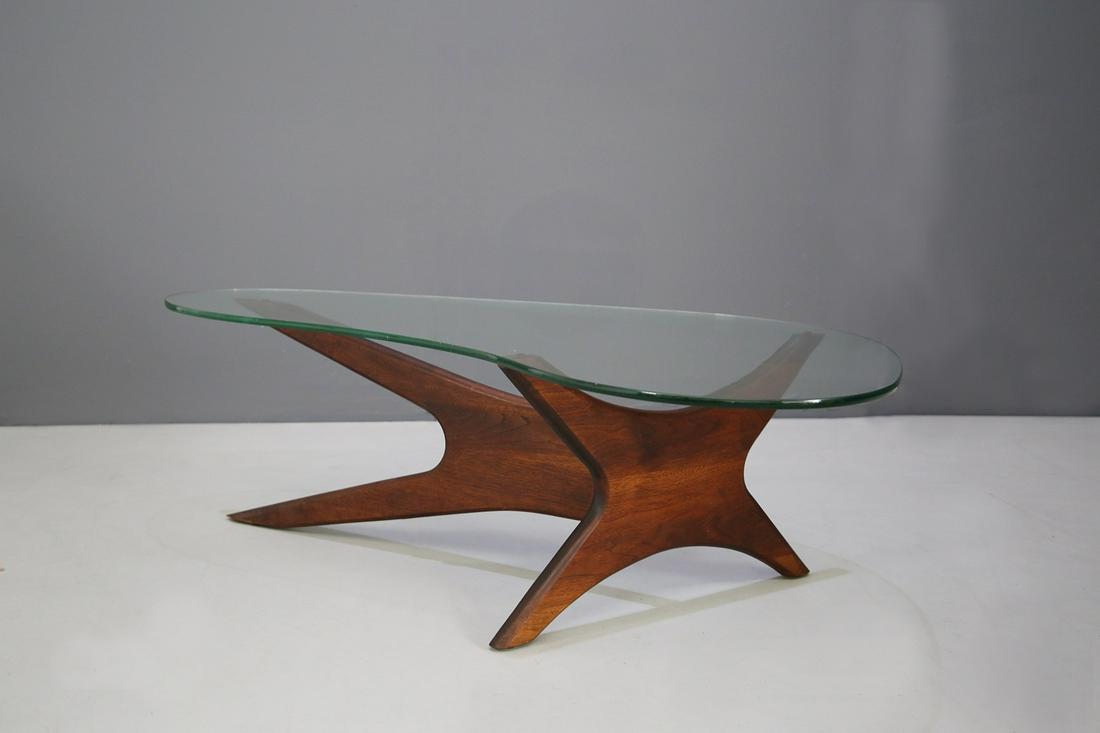Walnut coffee table by Adrian Pearsall for Craft: This vintage coffee table is a beautiful representation of the midcentury style. Made for the Craft Associates factory. The top of the table is made of glass shaped often in the shape of a kidney and