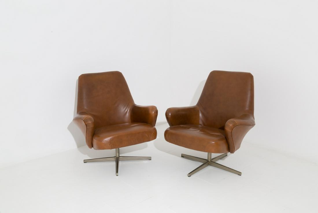 Armchairs by Gianni Moscatelli for Formanova, 1960s,: Width 85 cm Depth 65 cm Height 85 cm, Materials: Galvanized Metal, Leather, Color Tan, silver. Two swivel chairs in leather and metal. 1960.