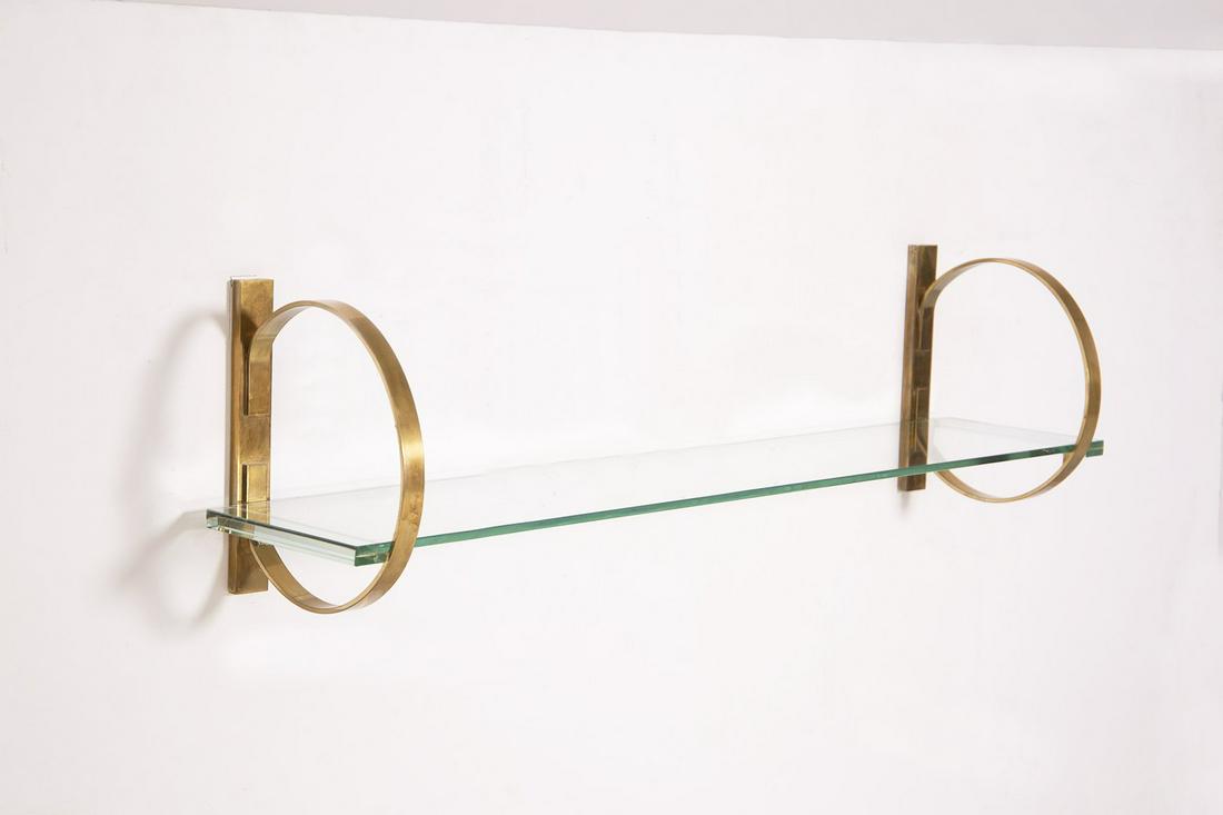 Italian Hanging Console Table in Glass and Brass: Italian hanging console table from the 1960s.The hanging console was made with a thick glass top of the time, transparent color tending to green.The glass top is supported by two circular brass bracke