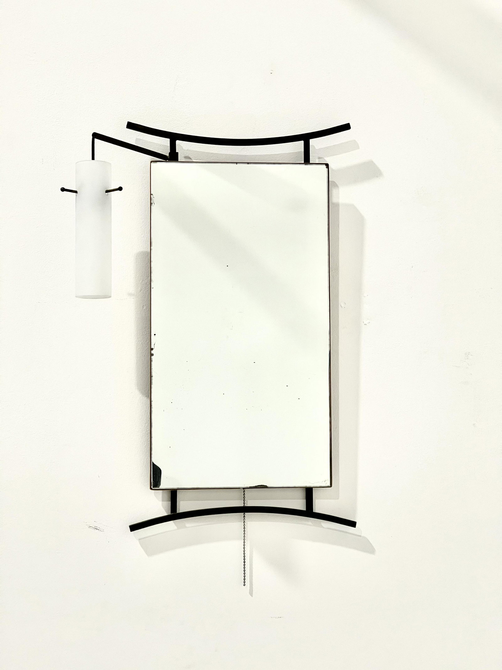 Italian Mirror with Lamp, 1960s: Metal, Glass, Mirrored glass. Dimensions: Height 63 cm Depth 14 cm Width 30.5 cm