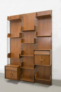 Vintage Bookcase in Wood by Gio Ponti: Height: 256 cm Width: 165,5 cm Depth: 39,5 cm. Gio Ponti.Vintage wooden bookcase in the 1950s, the manufacture of Gigi Radice. The bookcase is made entirely of wood, and its special feature is the fac