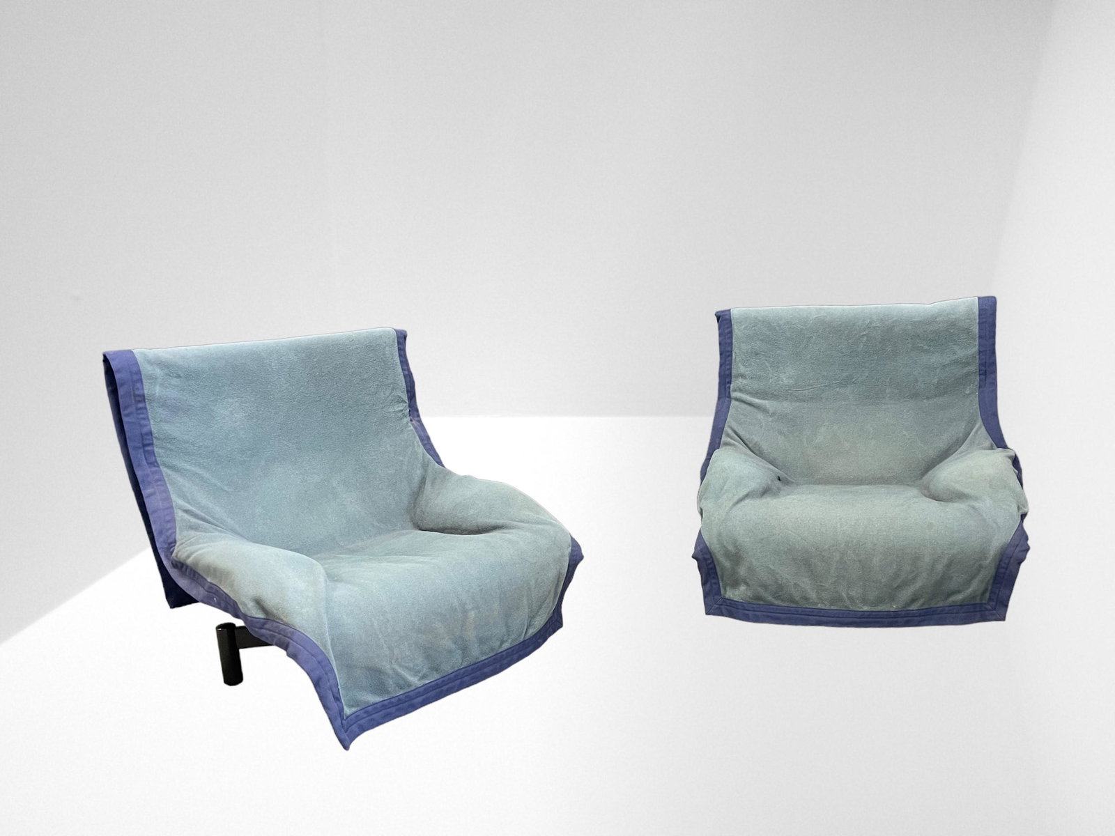 Pair of Sindbad Armchairs by Vico Magistretti for Cassina 1981: Width 106 cm Depth 88 cm Height 103 cm. Seat height 44 cm approx. The "unupholstered armchair" designed by Magistretti in 1981 for Cassina born from the idea of dressing the armchair with a blanket. A