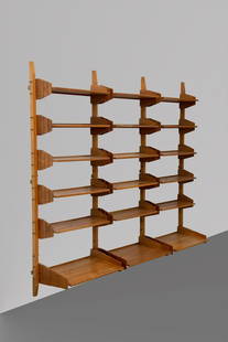 Wooden bookcase by Vittorio Gregotti: Height: 193 cm Width: 216 cm Depth: 44 cm Important modular bookcase designed by Vittorio Gregotti from the 1950s. Wooden structure and brass details. Italian manufacture. First patina. Published in