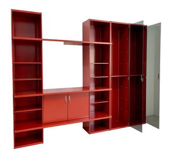 Vittorio Introini for Saporiti Pellican bookcase: Width cm. 267 Depth cm. 49 Height cm. 216 Pellican modular storage bookcase designed by Vittorio Introini for Saporiti. 1970s. Bordeaux lacquered wood, smoked glass and steel handles.The composition i