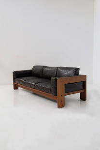 3-seater sofa model "Bastiano" by Afra & Tobia Scarpa: Height 69 cm Width 212 cm Depth 76 cm Seat 36 cm 3-seater sofa model "Bastiano" by Afra & Tobia Scarpa, Italian manufacture from the 1960s. The sofa consists of a wooden frame and 8 black leather cush