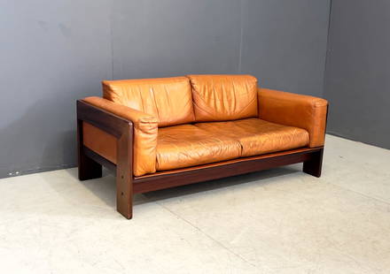 Bastiano Sofa by Afra & Tobia Scarpa for Gavina: Width cm 153 Depth cm 78 Height cm 69 Seat height cm 35 2-seater sofa model Bastiano with wooden frame and leather upholstery. Design by Tobia Scarpa, Gavina production, 1960s.