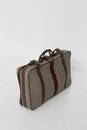 Gucci suitcase in GG fabric and leather