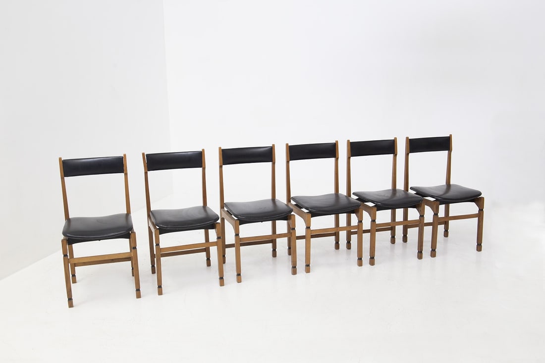 Vintage Italian chairs in wood and leather: Height: 81 cm Width: 40 cm Depth: 45 cm Seat Height: 43 cm Beautiful set of six wooden chairs designed in the 1950s, of fine Italian craftsmanship. The chairs have a very beautiful and durable wooden
