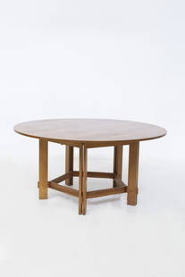 Vittorio Gregotti - Lodovico Meneghetti - Giotto Stoppino   ,  ,   Table in wood: Height: 77 cm Diameter: 159 cmItalian-made table from the 1950s. Drawing of the original design in our possession. The table is entirely made of wood with sharp and outlined geometric shapes. The tabl