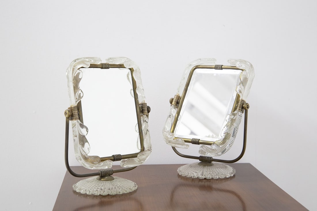 Ercole Barovier Pair of table mirrors: Height: 58 cm Width: 40 cm Depth: 10 cm Pair of 1950s Italian table mirrors by Barovier and Toso. The mirror turns double-sided. The second face features a photo holder.