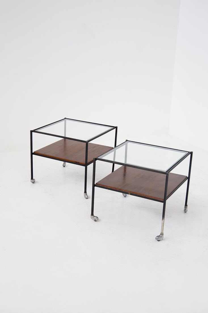 Azucena Pair of Living Room Tables in Glass: Height: 45 cm Width: 51 cm Depth: 51 cmPair of coffee tables made in the 50s by the Azucena factory.Made with wooden and glass top. The feet are with castors to facilitate their movement.