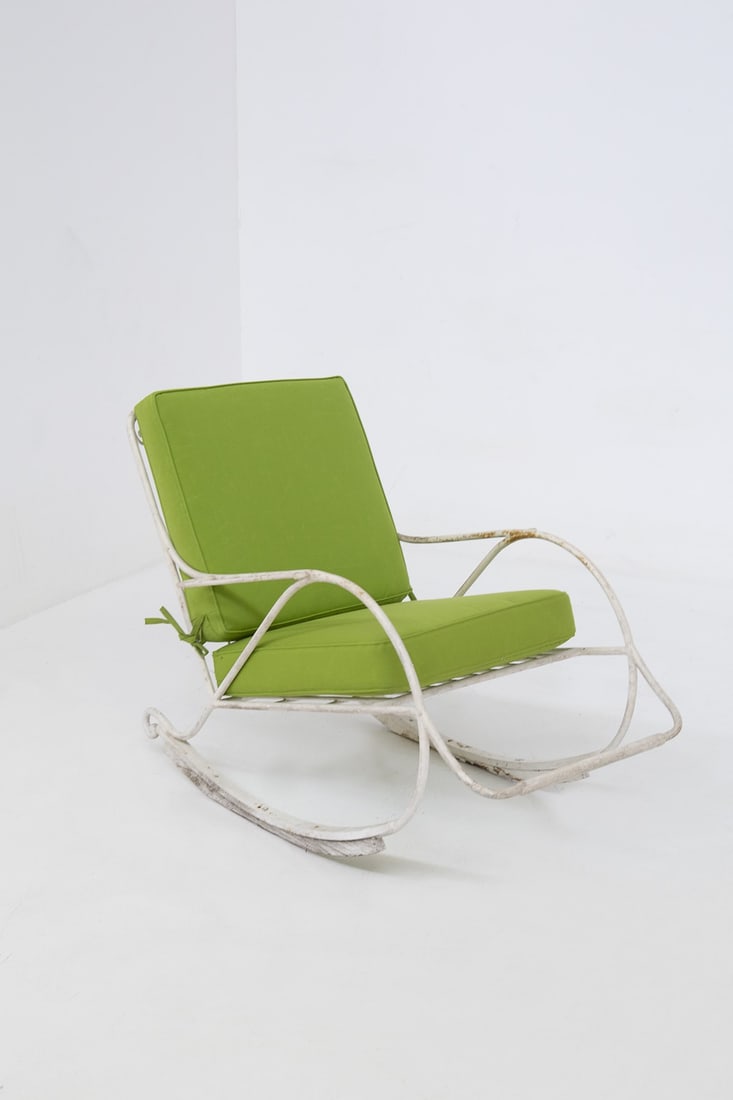 Lio Carminati Outdoor Rocking Chair, Published: Height: 90 cm Width: 81 cm Depth: 120 cmBeautiful iron rocking chair designed by Lio Carminati in Casa e Giardino edition in collaboration with Gio Ponti in the 1950s, with publication in the book Alp