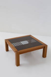 Manifattura Italiana    Vintage Italian coffee table: Height: 39 cm Width: 79.5 cm Depth: 79.5 cmItalian geometric coffee table 1970s, wood and smoked glass top.