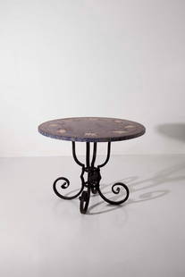Manifattura Italiana    Vintage Italian Coffee Table with Marble Top  1900: Height: 100 cm Diameter: 77 cmItalian coffee table from early 1900s. Wrought-iron legs with elegant curls. Marble top with mosaic and eight white marble elephants on a blue background with purple marb