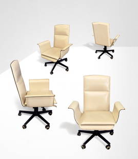 Luca Scacchetti    Four Office Armchairs: Width 73 cm Depth 59 cm Height 100 cm Seat height 43.5 cmExecutive armchairs model WING. Wing is a leather executive office chair that swivels and has casters.Design by Luca Scacchetti, 2001. Producti
